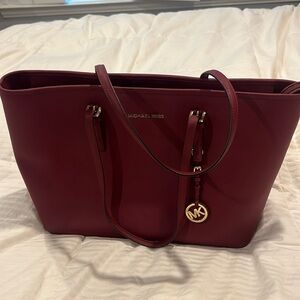 EUC Michael Kors Jet Set tote large in wine
